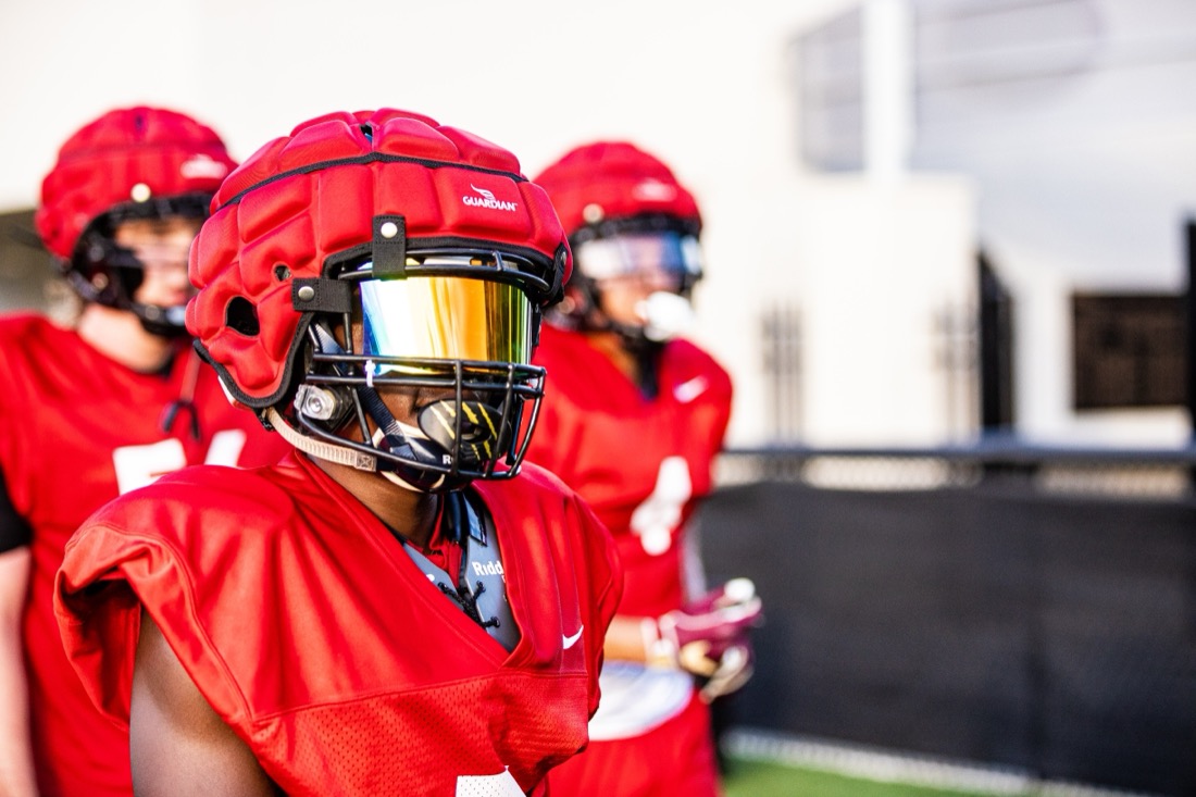 High school football preseason practice — position and contact drills