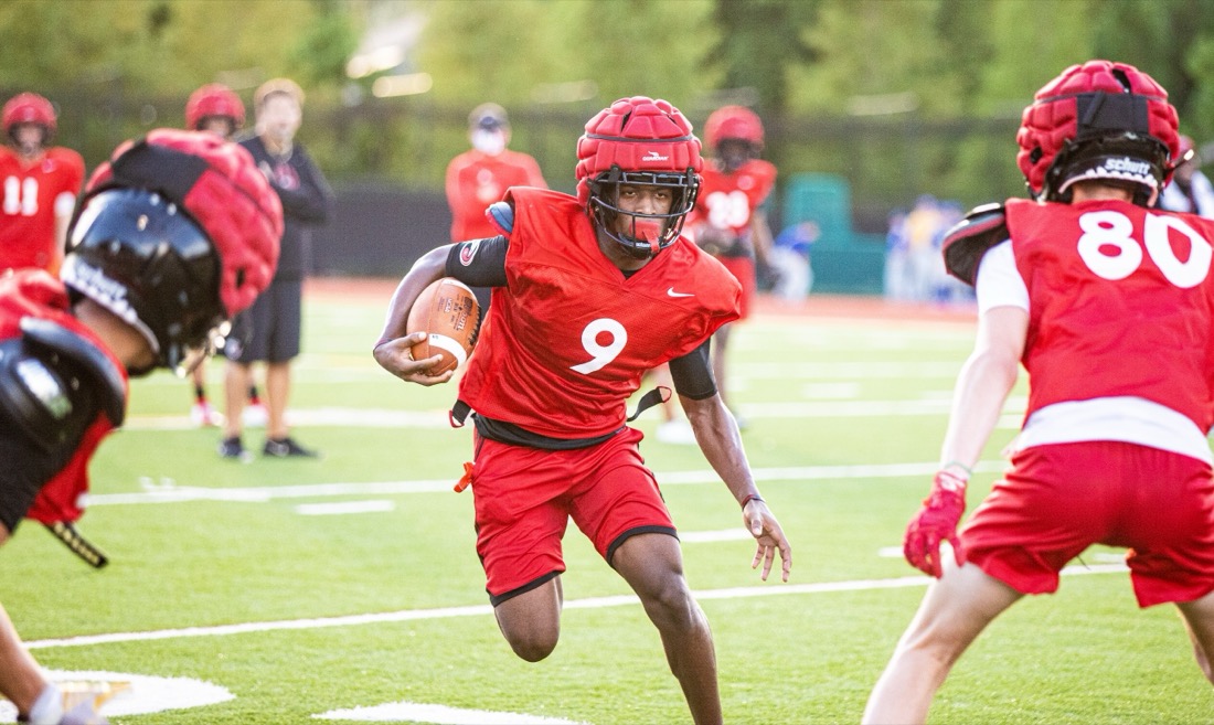 High school football preseason practice — position and contact drills