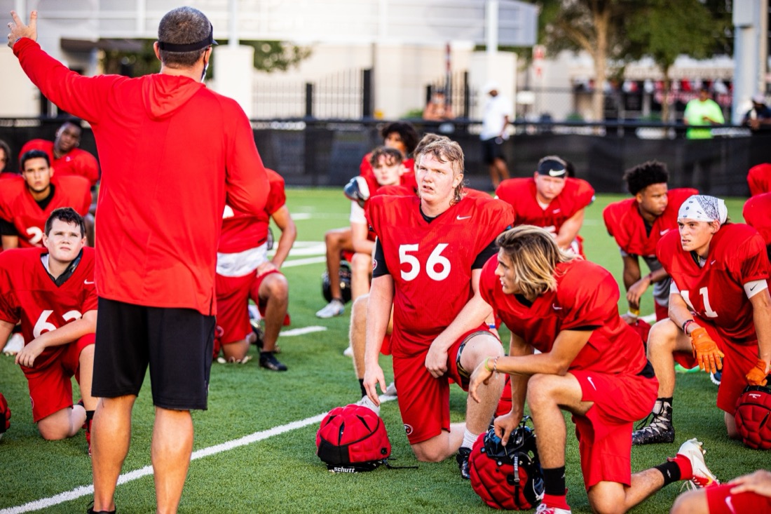 High school football preseason practice — position and contact drills